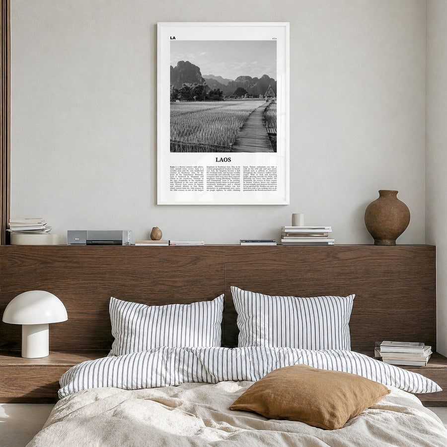 Laos Newspaper No 3 Poster in a white wood frame, hanging in a bedroom