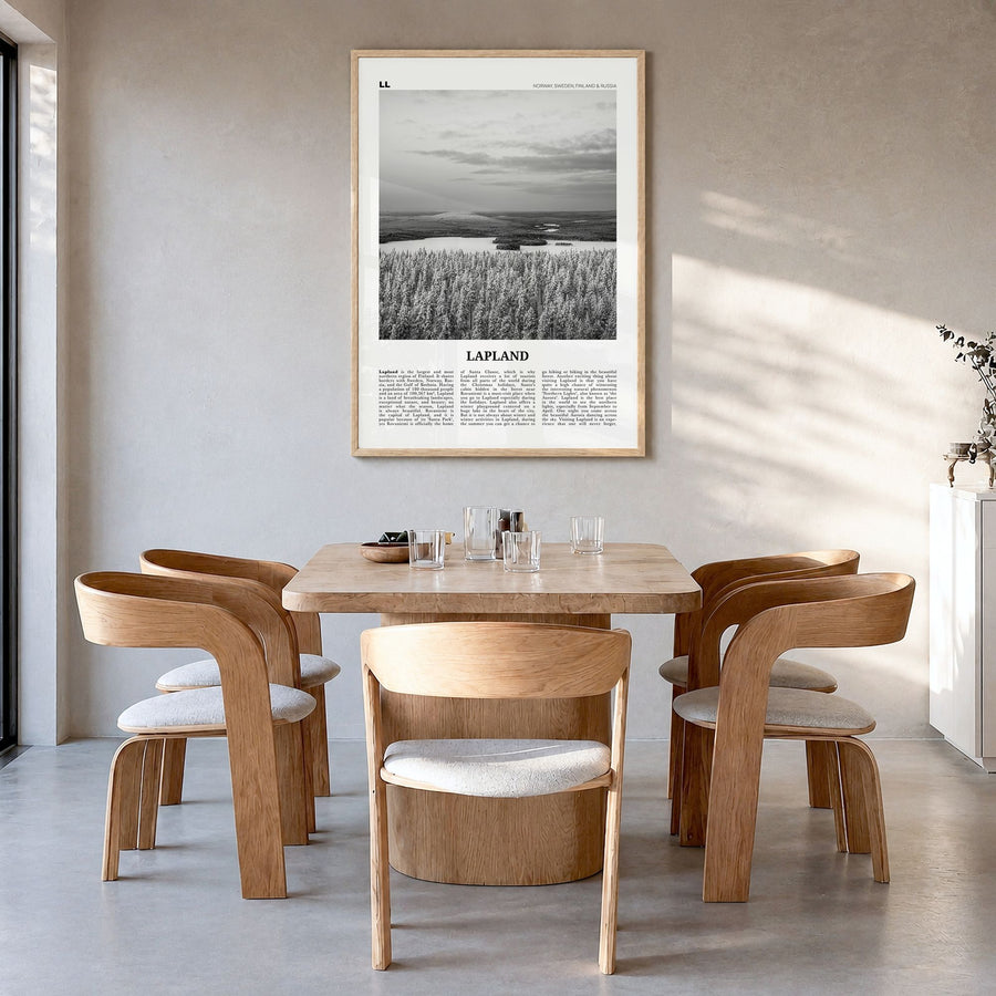 Lapland Newspaper Poster in a natural wood frame, hanging in a dining room