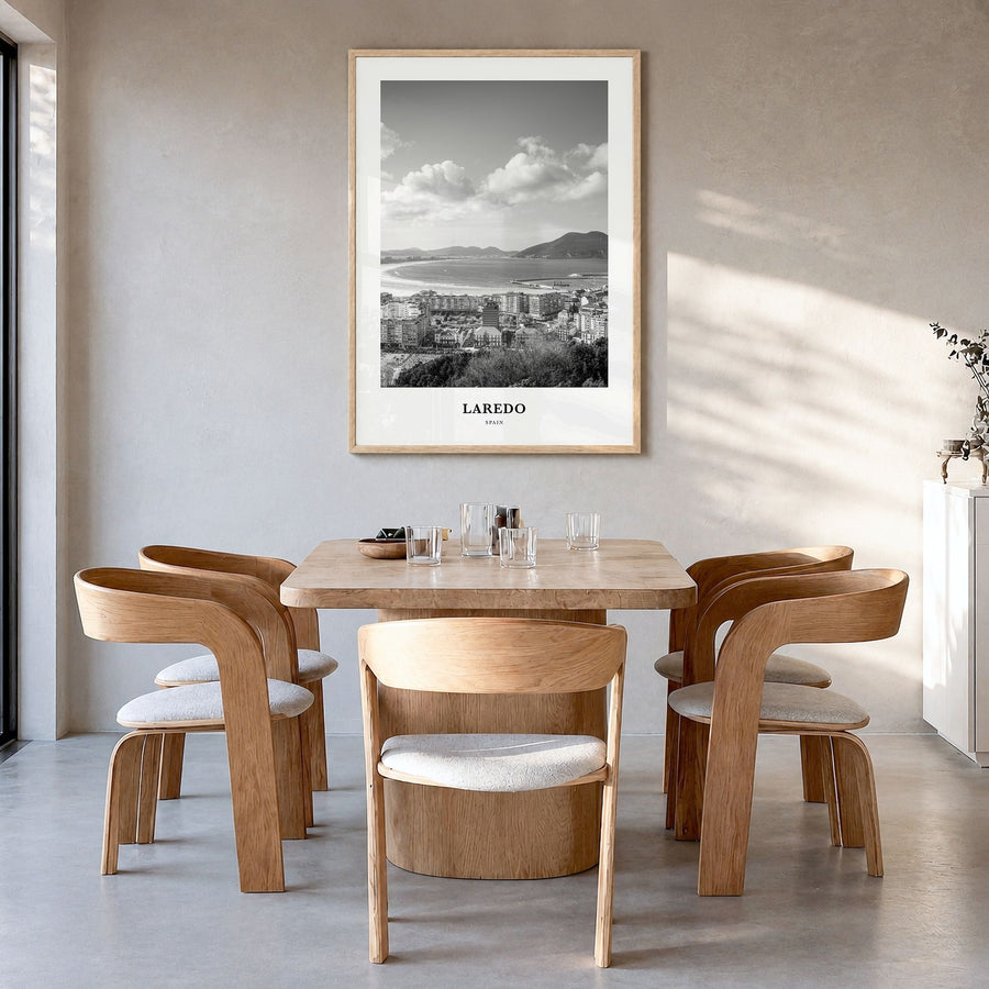 Laredo, Spain Classic Poster in a natural wood frame, hanging in a dining room