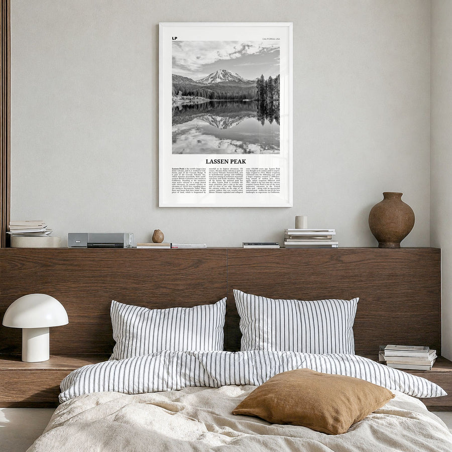 Lassen Peak Newspaper Poster in a white wood frame, hanging in a bedroom