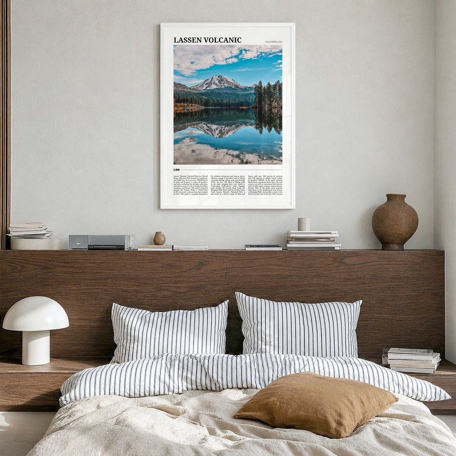 Lassen Volcanic National Park Travel Poster in a white wood frame, hanging in a bedroom