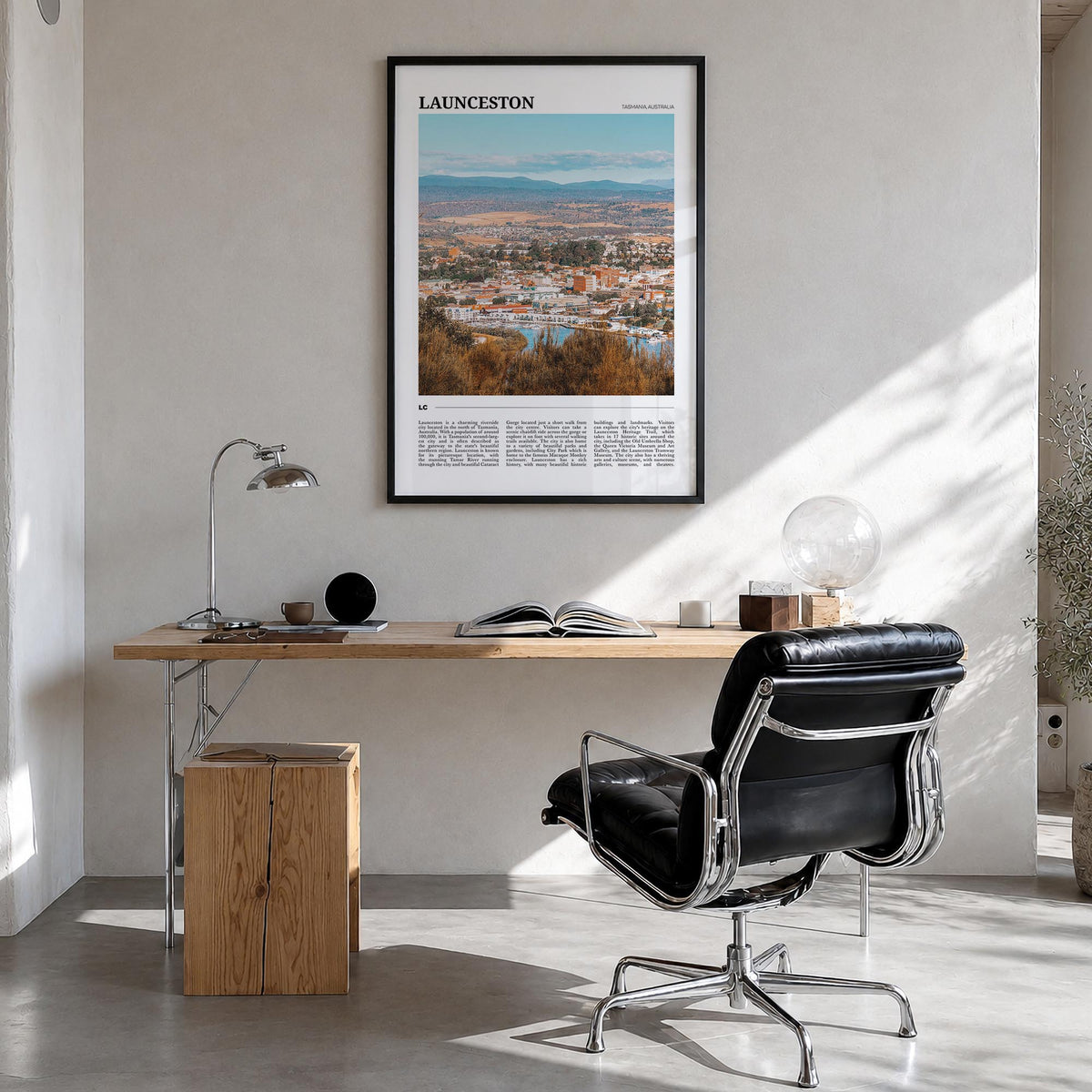 Launceston colorful travel poster of Australia – vertical wall art in black wood frame, hanging on wall