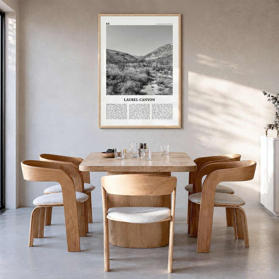 Laurel Canyon Newspaper Poster in a natural wood frame, hanging in a dining room