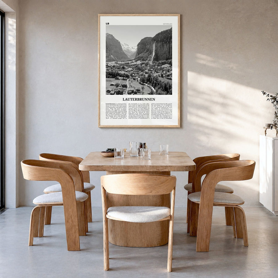 Lauterbrunnen Newspaper Poster in a natural wood frame, hanging in a dining room