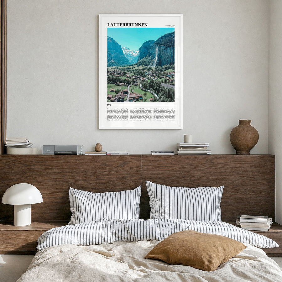 Lauterbrunnen Travel Poster in a white wood frame, hanging in a bedroom
