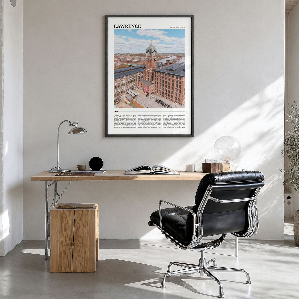 Lawrence, Massachusetts Travel Poster in a black wood frame, hanging in a bright home office