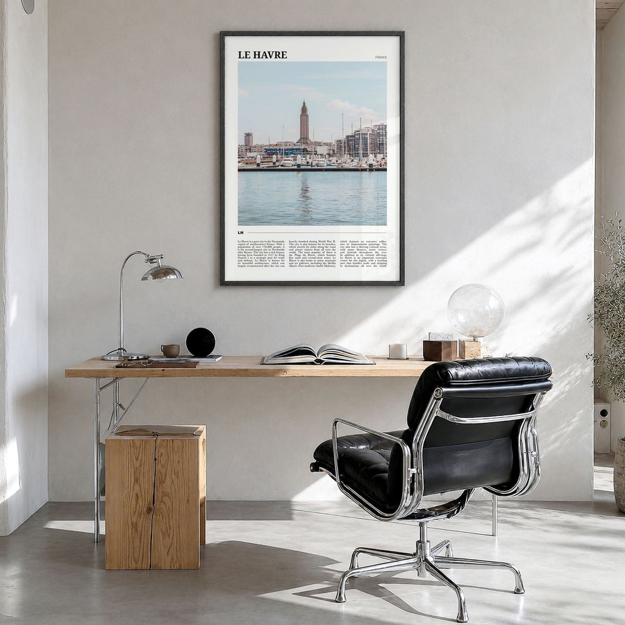 Le Havre Travel Poster in a black wood frame, hanging in a bright home office