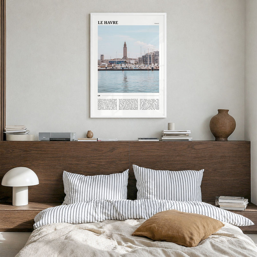 Le Havre Travel Poster in a white wood frame, hanging in a bedroom