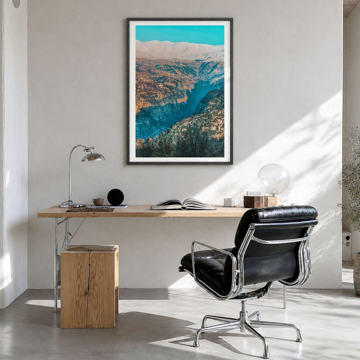Lebanon Photo Poster in a black wood frame, hanging in a bright home office, white border