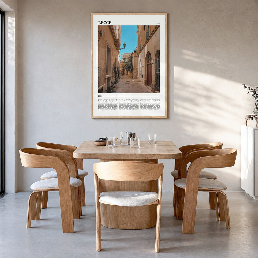 Lecce Travel Poster in a natural wood frame, hanging in a dining room