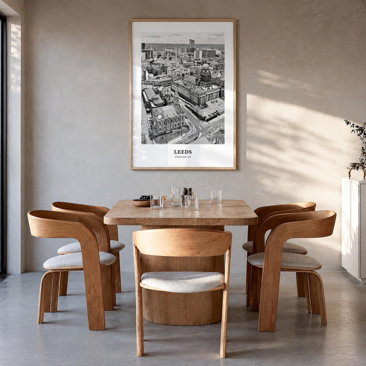 Leeds black & white classic poster of England, UK – vertical wall art in natural wood frame, hanging on wall