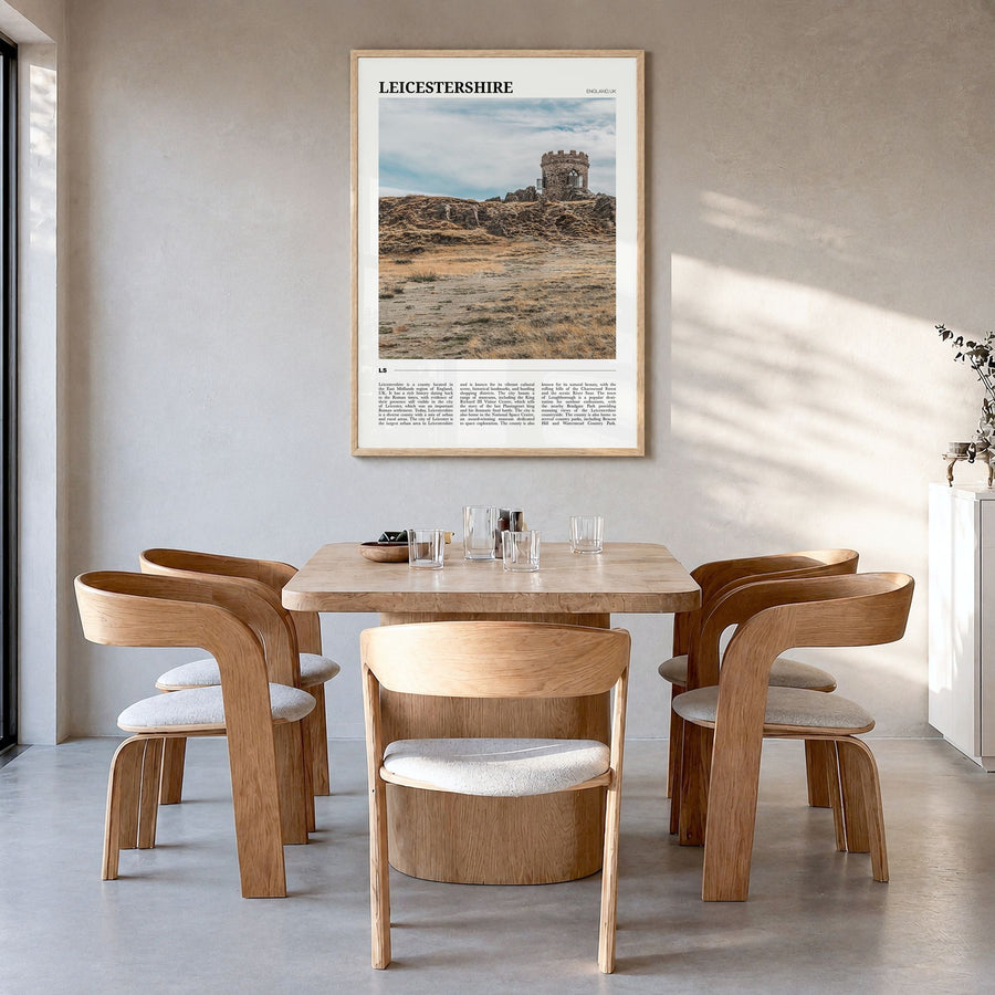 Leicestershire Travel Poster in a natural wood frame, hanging in a dining room