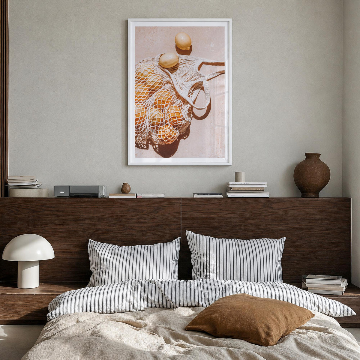 Lemons no. 1 colorful photo poster – vertical wall art in white wood frame with white border, hanging on wall