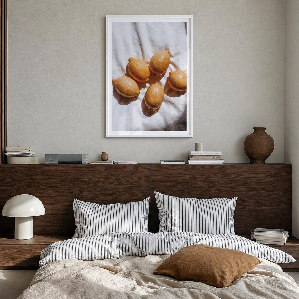 Lemons no. 2 colorful photo poster – vertical wall art in white wood frame with white border, hanging on wall