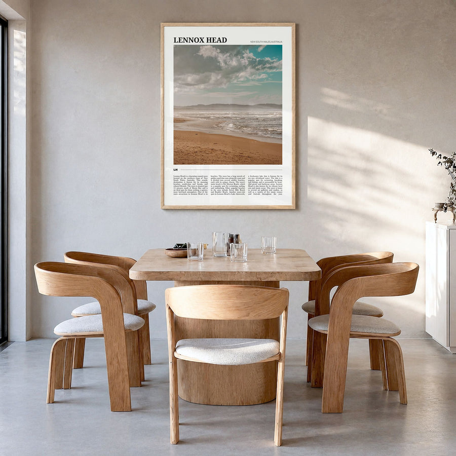 Lennox Head Travel Poster in a natural wood frame, hanging in a dining room