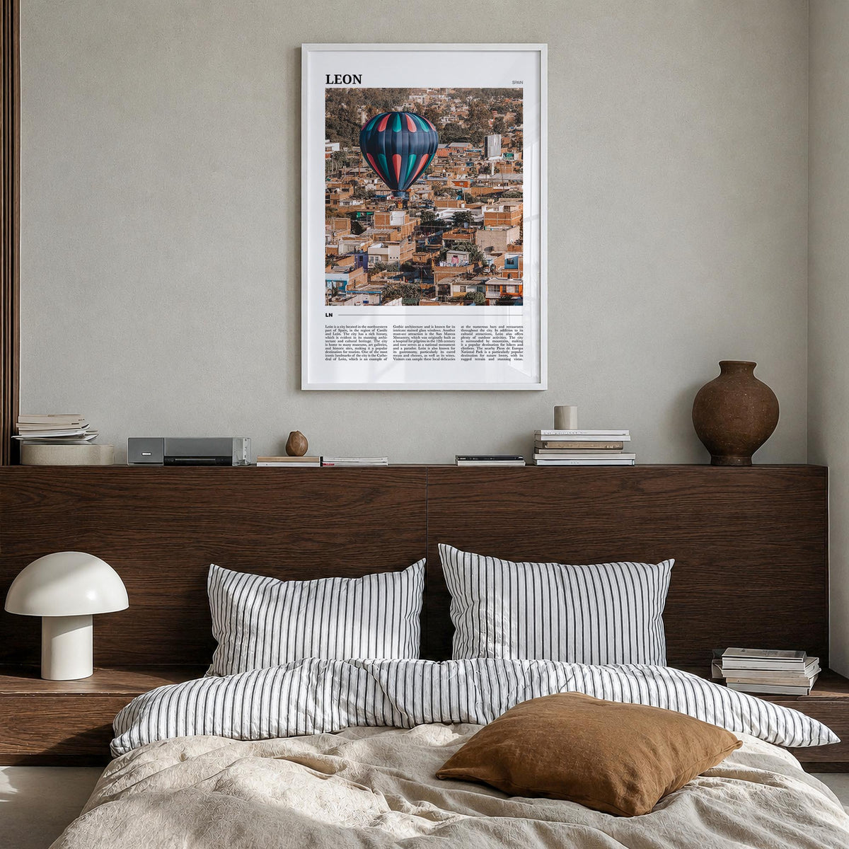 León no. 2 colorful travel poster of Spain – vertical wall art in white wood frame, hanging on wall