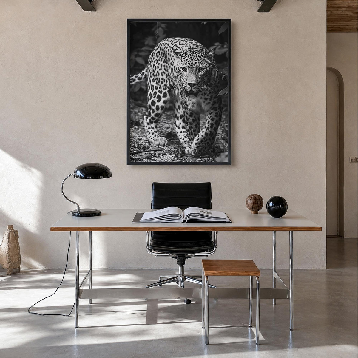 Leopard no. 1 black & white photo poster – vertical wall art in black wood frame, hanging on wall