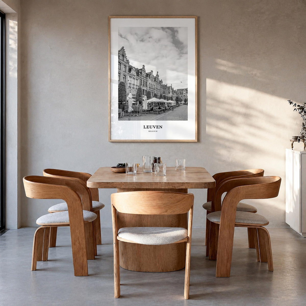 Leuven no. 1 black & white classic poster of Belgium – vertical wall art in natural wood frame, hanging on wall