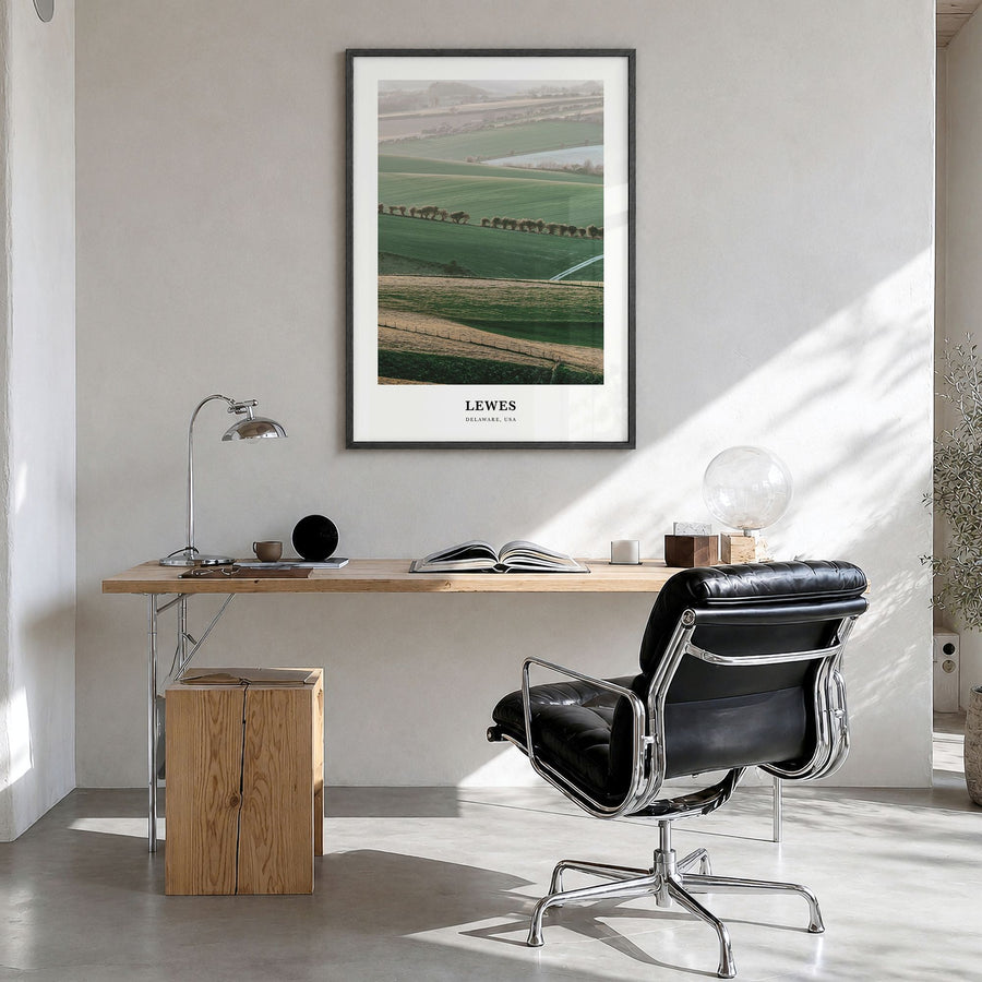 Lewes Classic Poster in a black wood frame, hanging in a bright home office