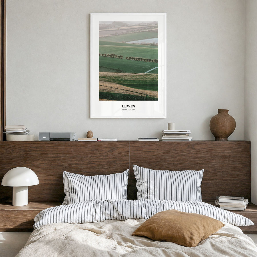 Lewes Classic Poster in a white wood frame, hanging in a bedroom