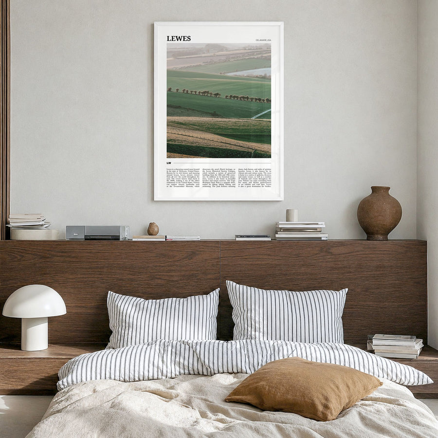 Lewes Travel Poster in a white wood frame, hanging in a bedroom