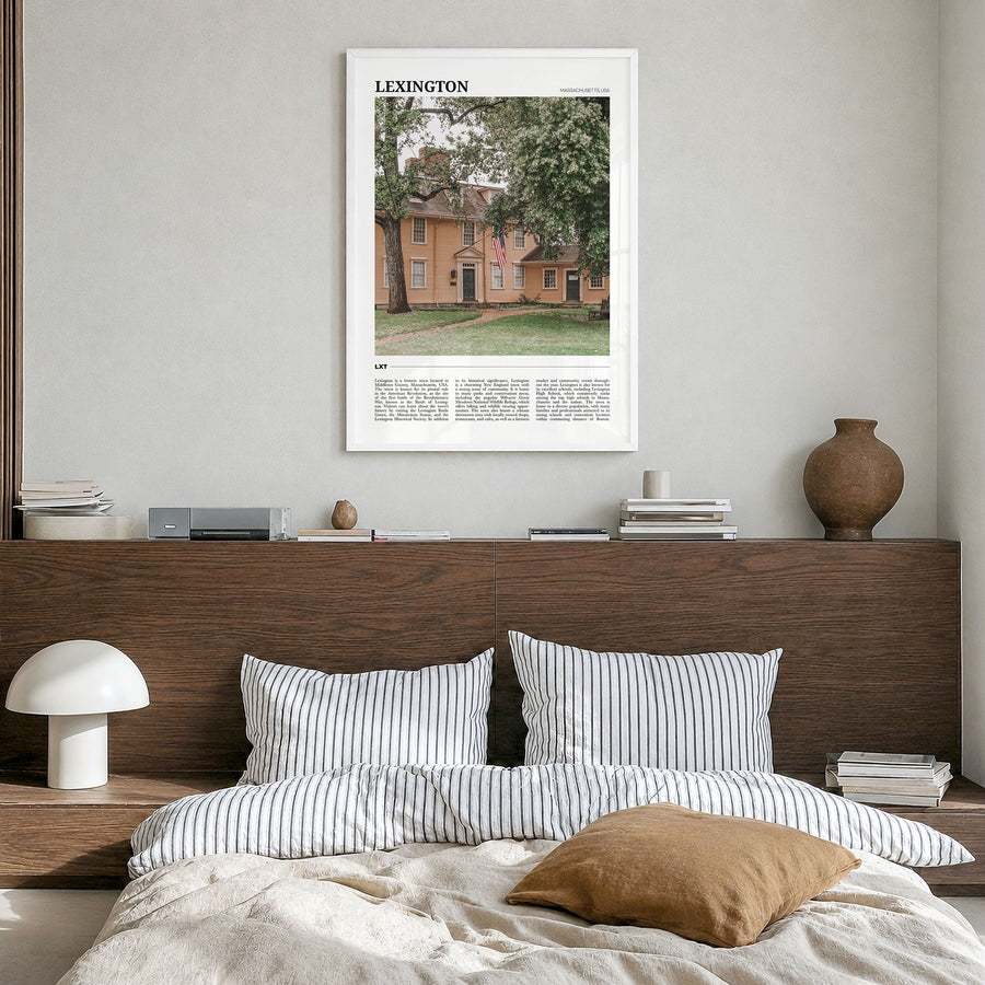 Lexington, Massachusetts Travel Poster in a white wood frame, hanging in a bedroom