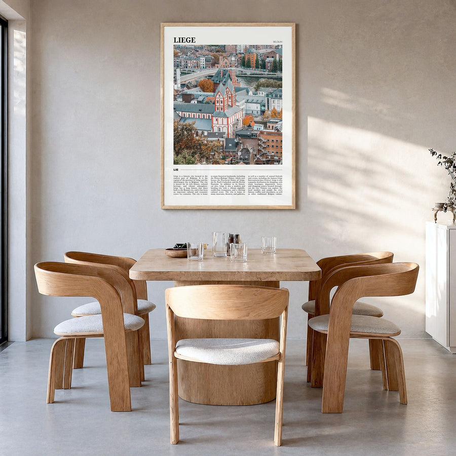 Liège Travel Poster in a natural wood frame, hanging in a dining room