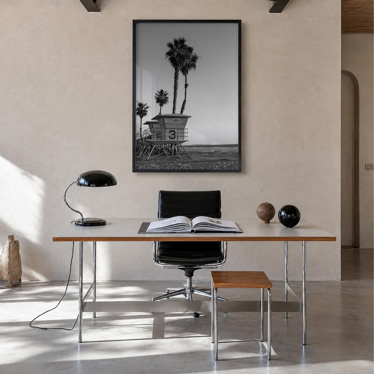 Lifeguard Stand no. 2 black & white photo poster – vertical wall art in black wood frame, hanging on wall