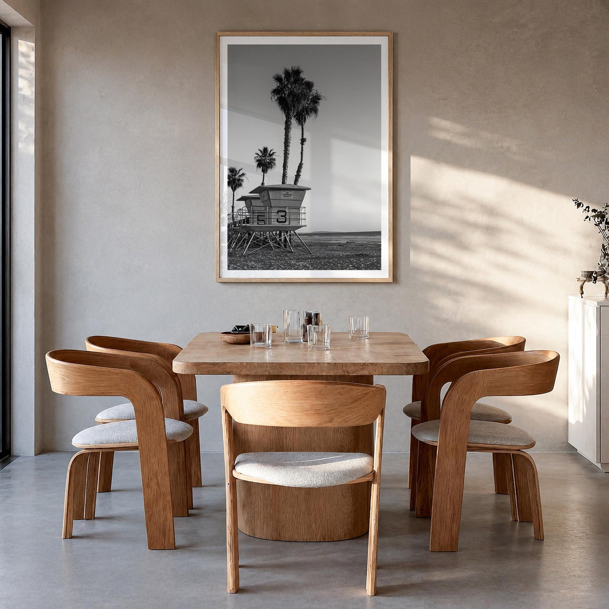Lifeguard Stand no. 2 black & white photo poster – vertical wall art in natural wood frame with white border, hanging on wall