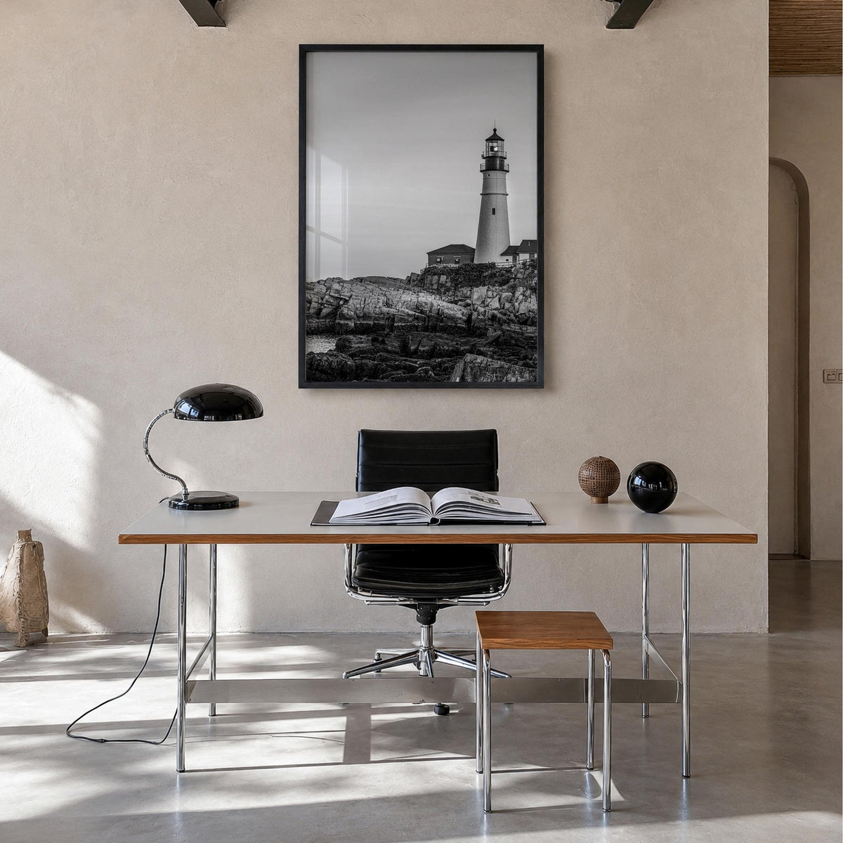 Lighthouse no. 1 black & white photo poster – vertical wall art in black wood frame, hanging on wall