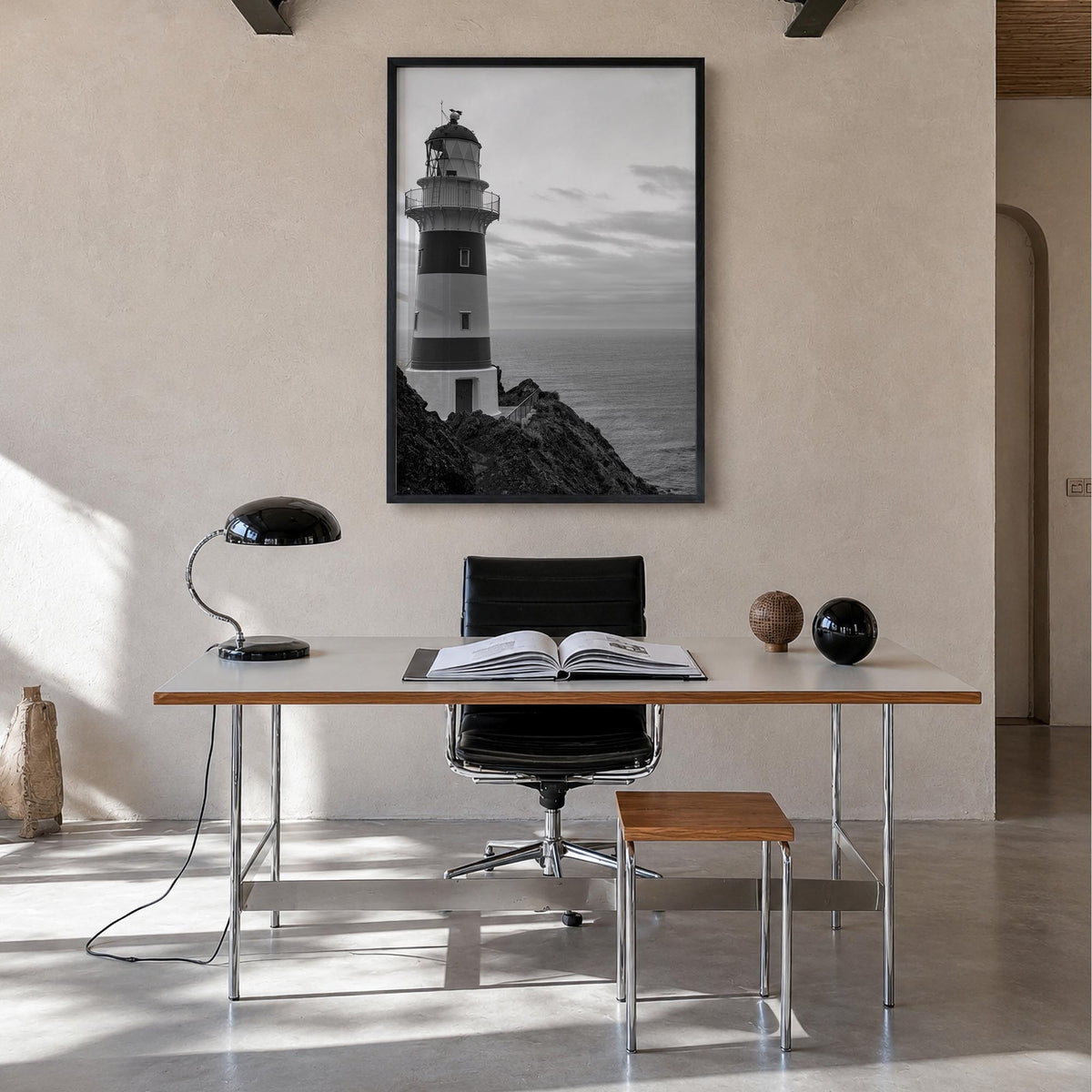 Lighthouse no. 2 black & white photo poster – vertical wall art in black wood frame, hanging on wall