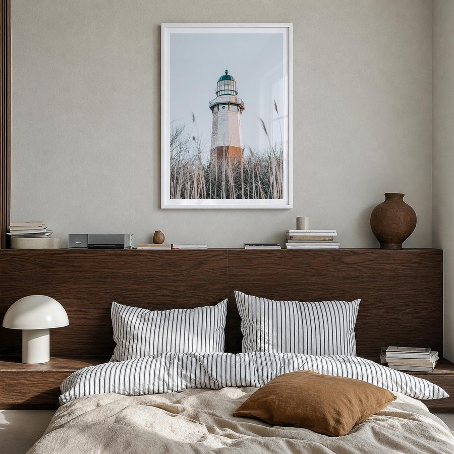 Lighthouse no. 6 colorful photo poster – vertical wall art in white wood frame with white border, hanging on wall
