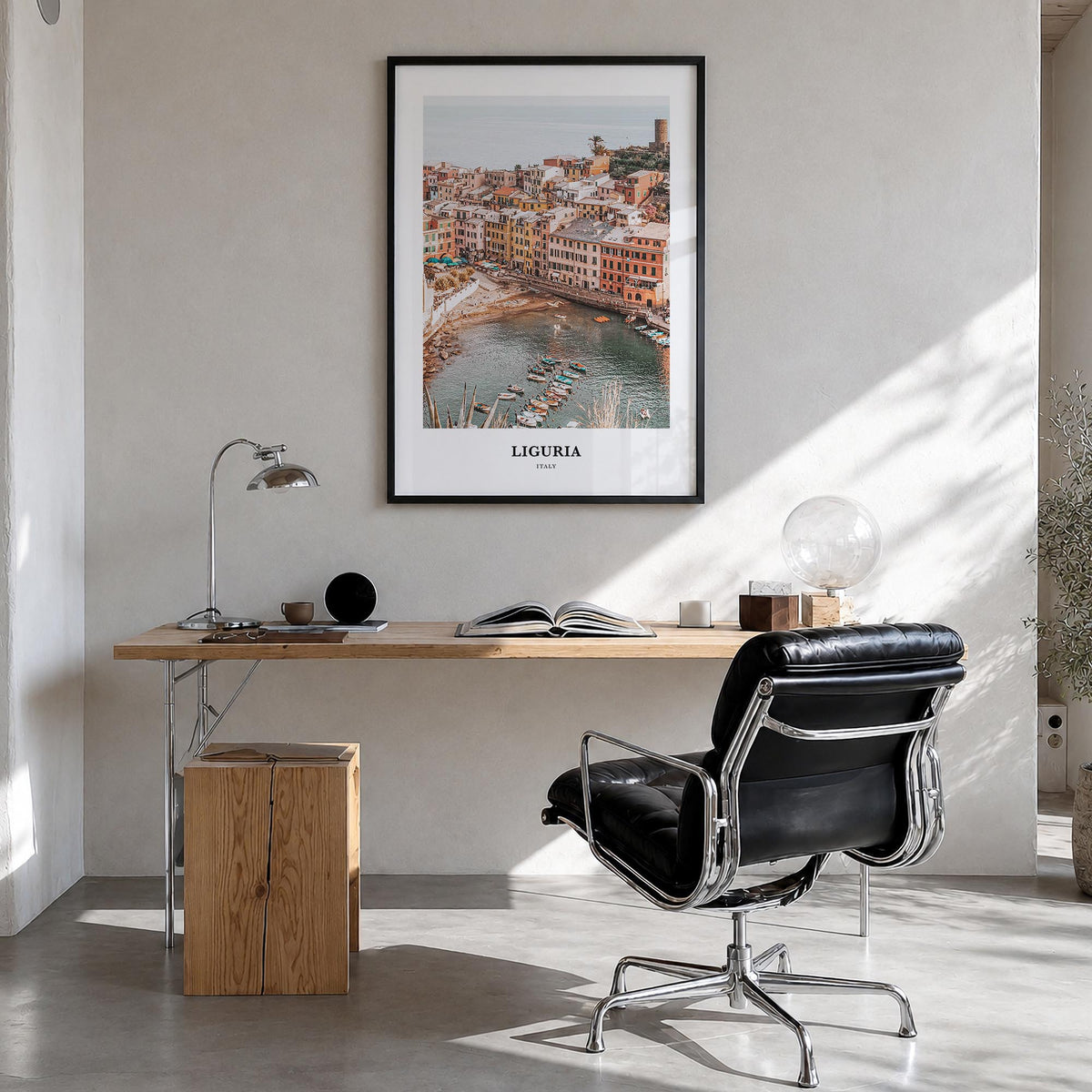 Liguria colorful classic poster of Italy – vertical wall art in black wood frame, hanging on wall