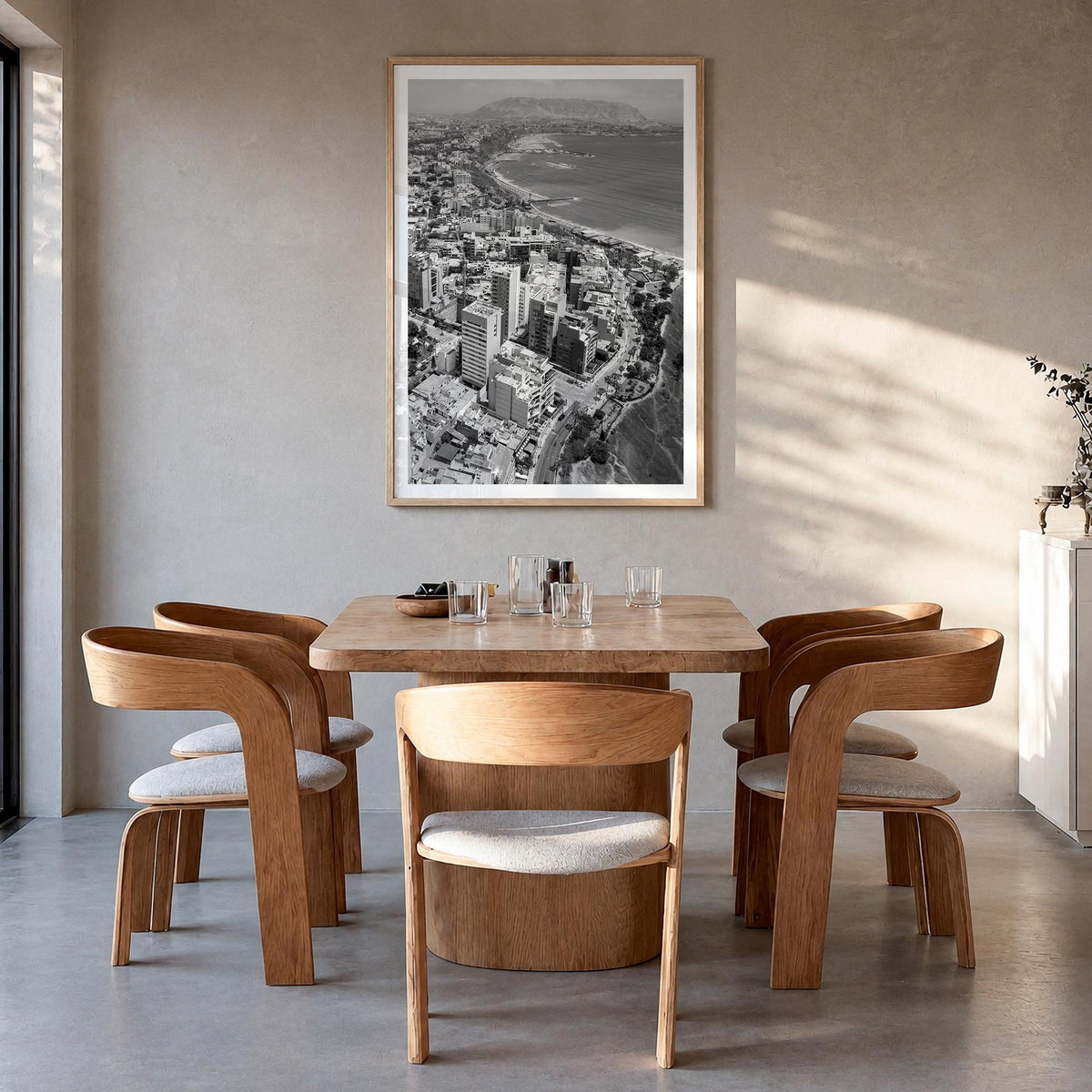 Lima black & white photo poster of Peru – vertical wall art in natural wood frame with white border, hanging on wall