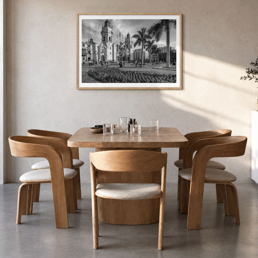 Lima Photo Poster in a natural wood frame, hanging in a dining room, white border