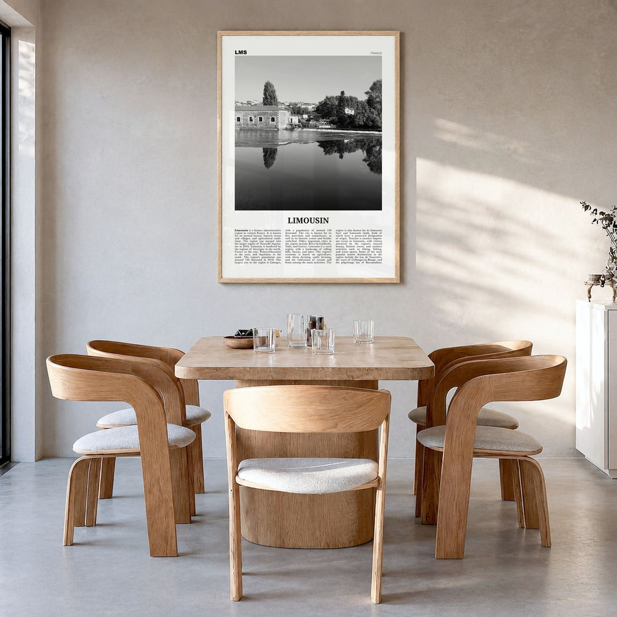 Limousin Newspaper Poster in a natural wood frame, hanging in a dining room