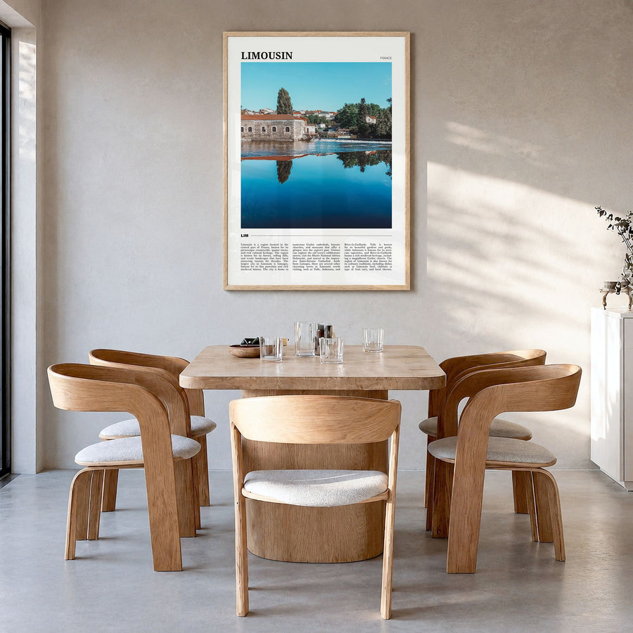 Limousin Travel Poster in a natural wood frame, hanging in a dining room