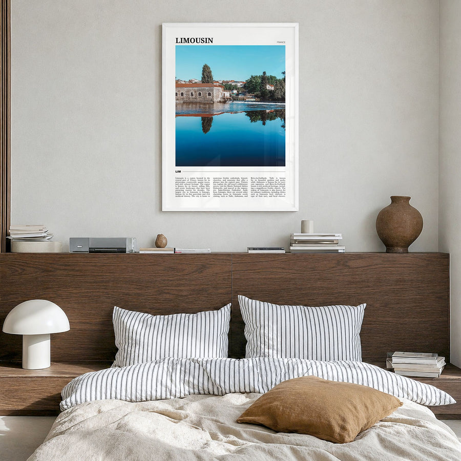 Limousin Travel Poster in a white wood frame, hanging in a bedroom