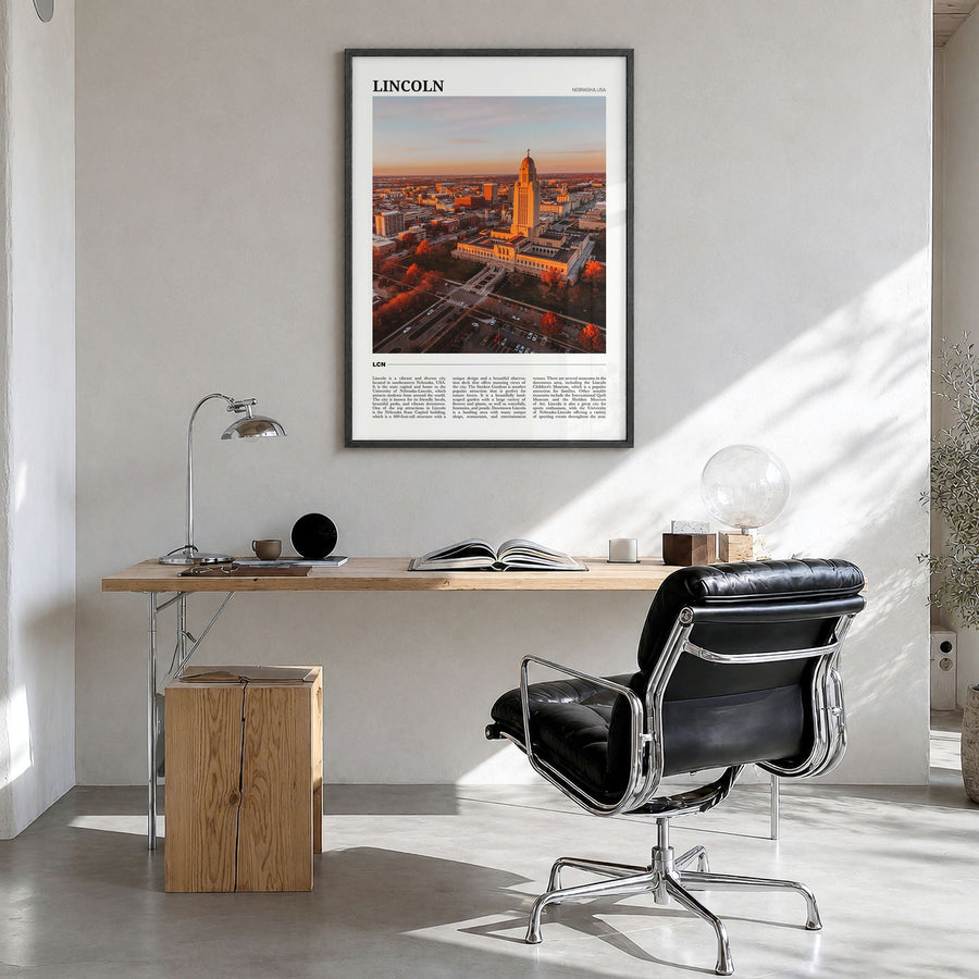 Lincoln Travel Poster in a black wood frame, hanging in a bright home office