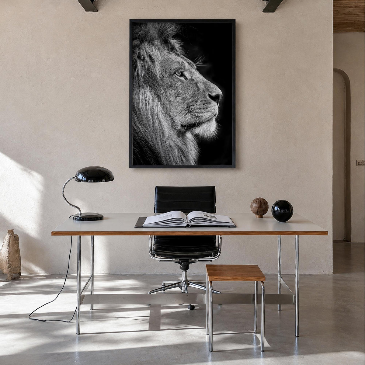 Lion no. 1 black & white photo poster – vertical wall art in black wood frame, hanging on wall