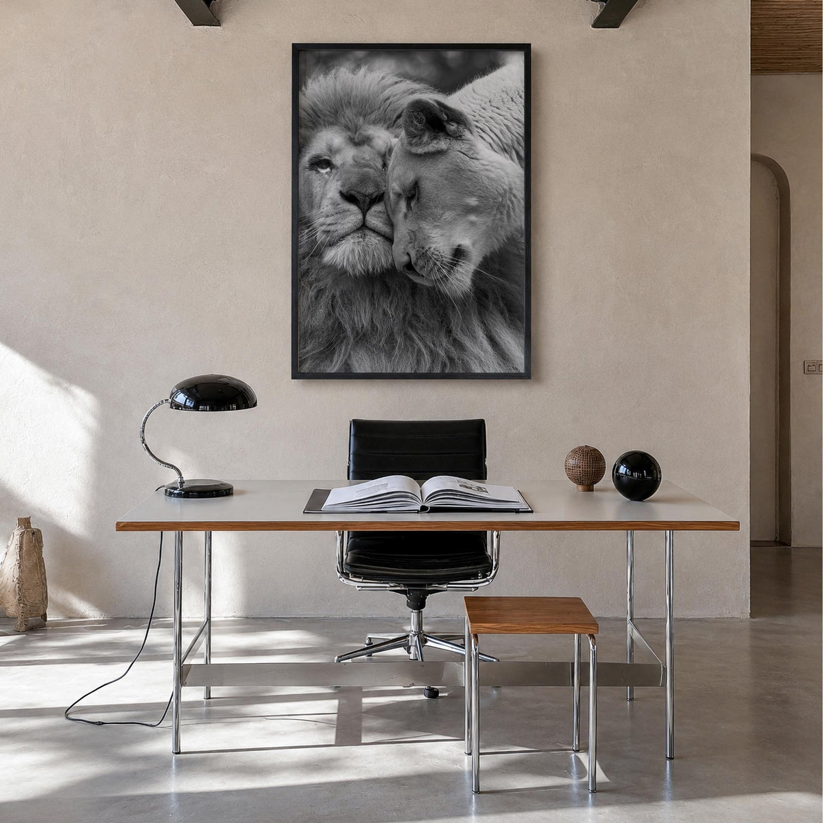 Lion no. 2 black & white photo poster – vertical wall art in black wood frame, hanging on wall