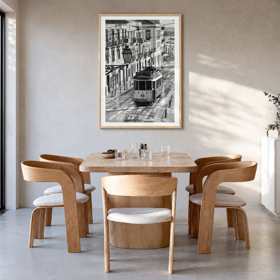 Lisbon Photo No 3 Poster in a natural wood frame, hanging in a dining room, white border