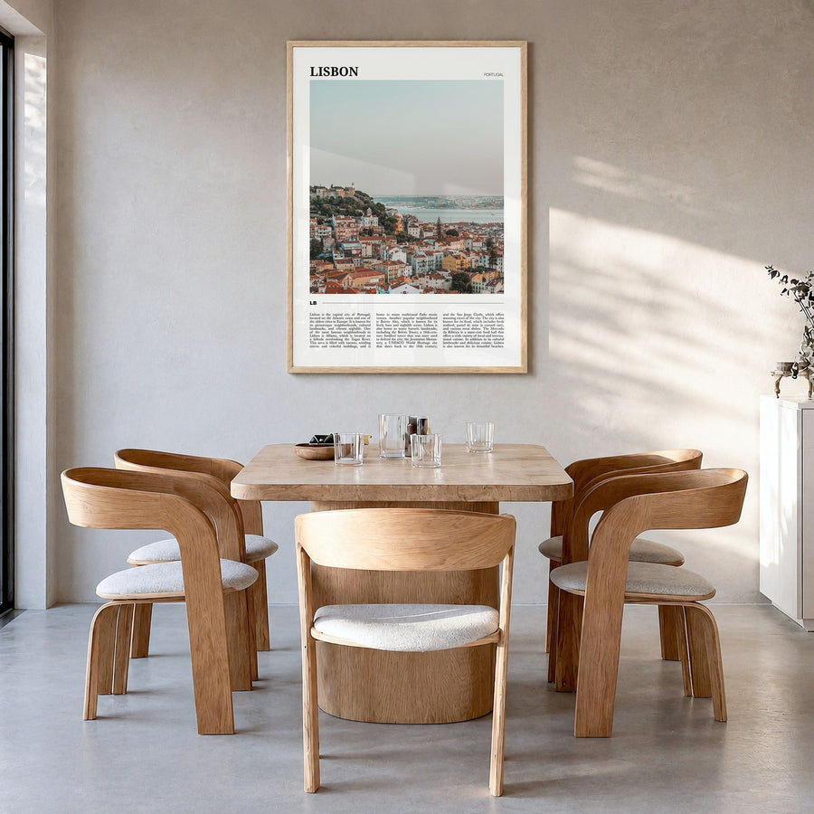 Lisbon Travel Poster in a natural wood frame, hanging in a dining room