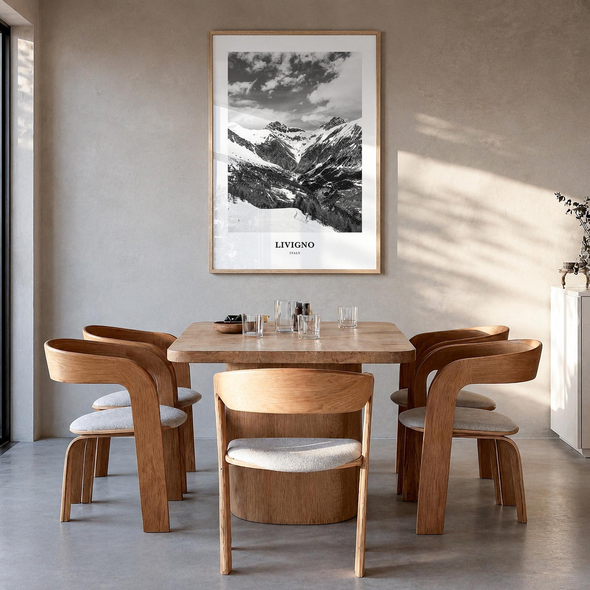 Livigno black & white classic poster of Italy – vertical wall art in natural wood frame, hanging on wall
