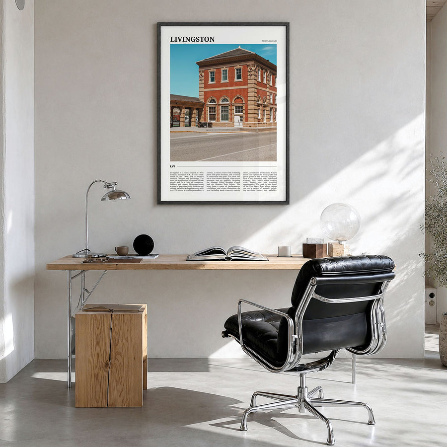 Livingston Travel Poster in a black wood frame, hanging in a bright home office