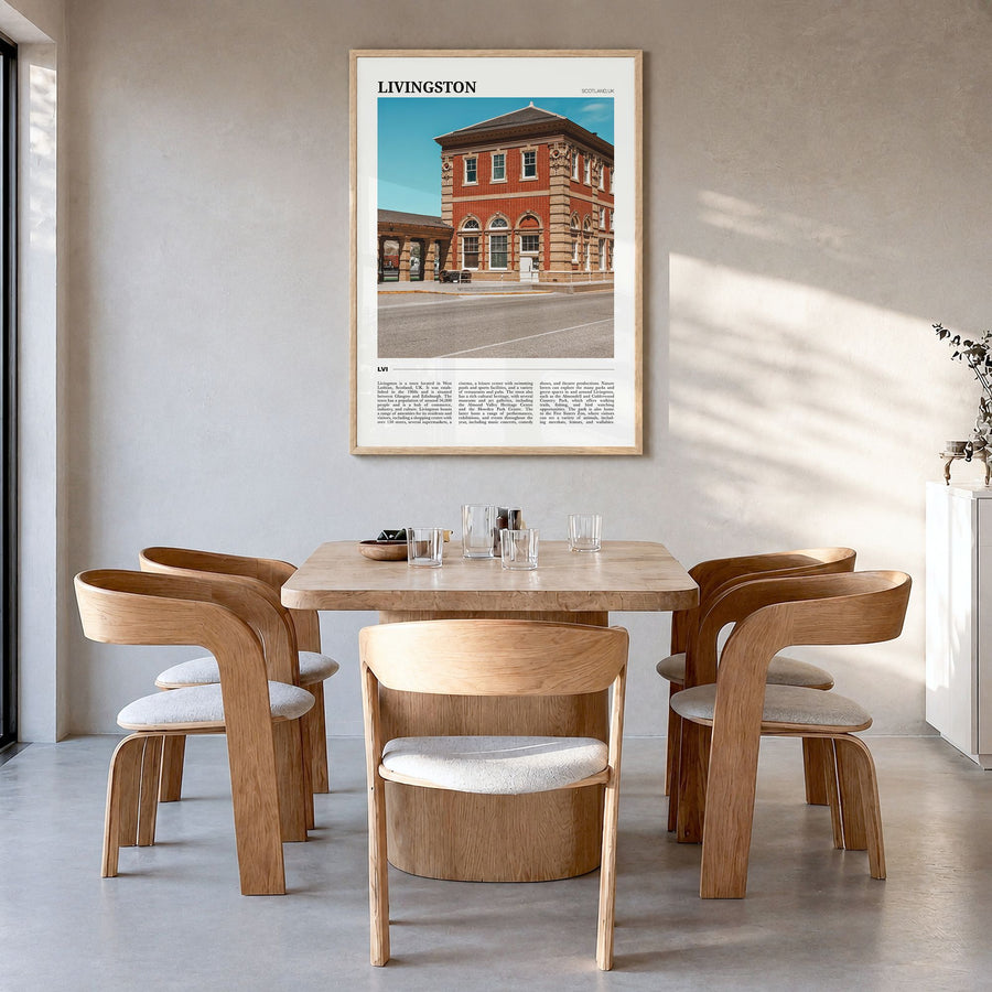Livingston Travel Poster in a natural wood frame, hanging in a dining room