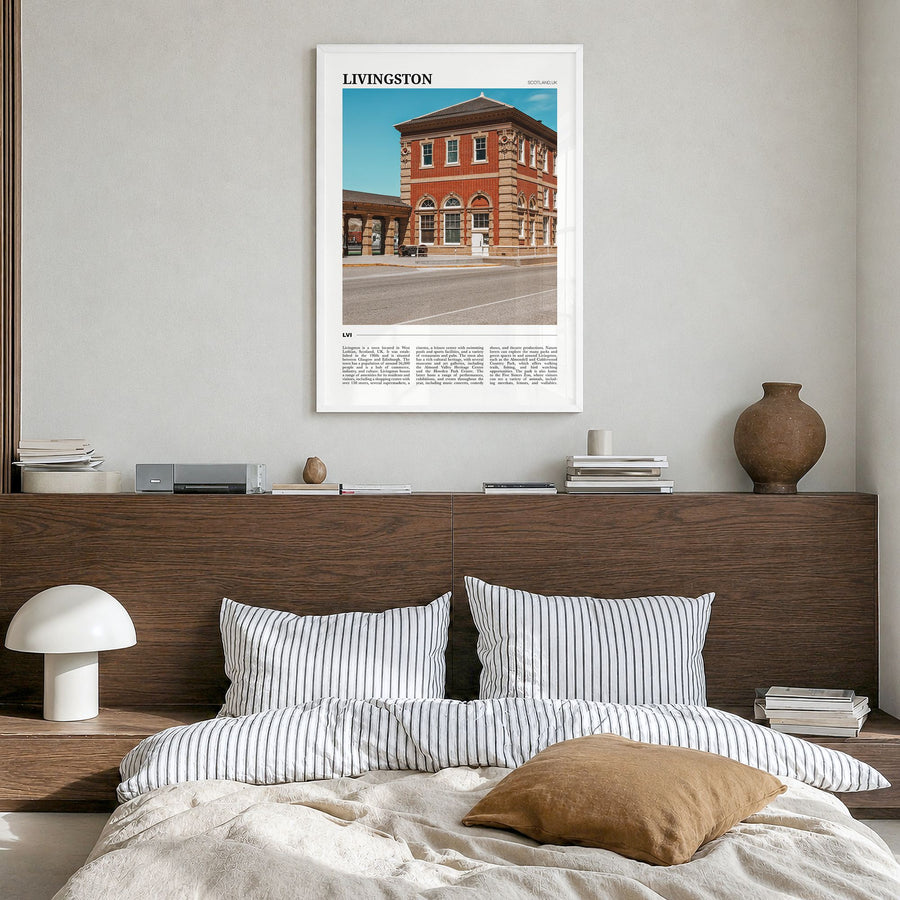 Livingston Travel Poster in a white wood frame, hanging in a bedroom