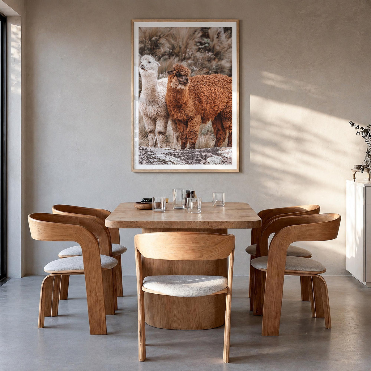 Llama colorful photo poster – vertical wall art in natural wood frame with white border, hanging on wall