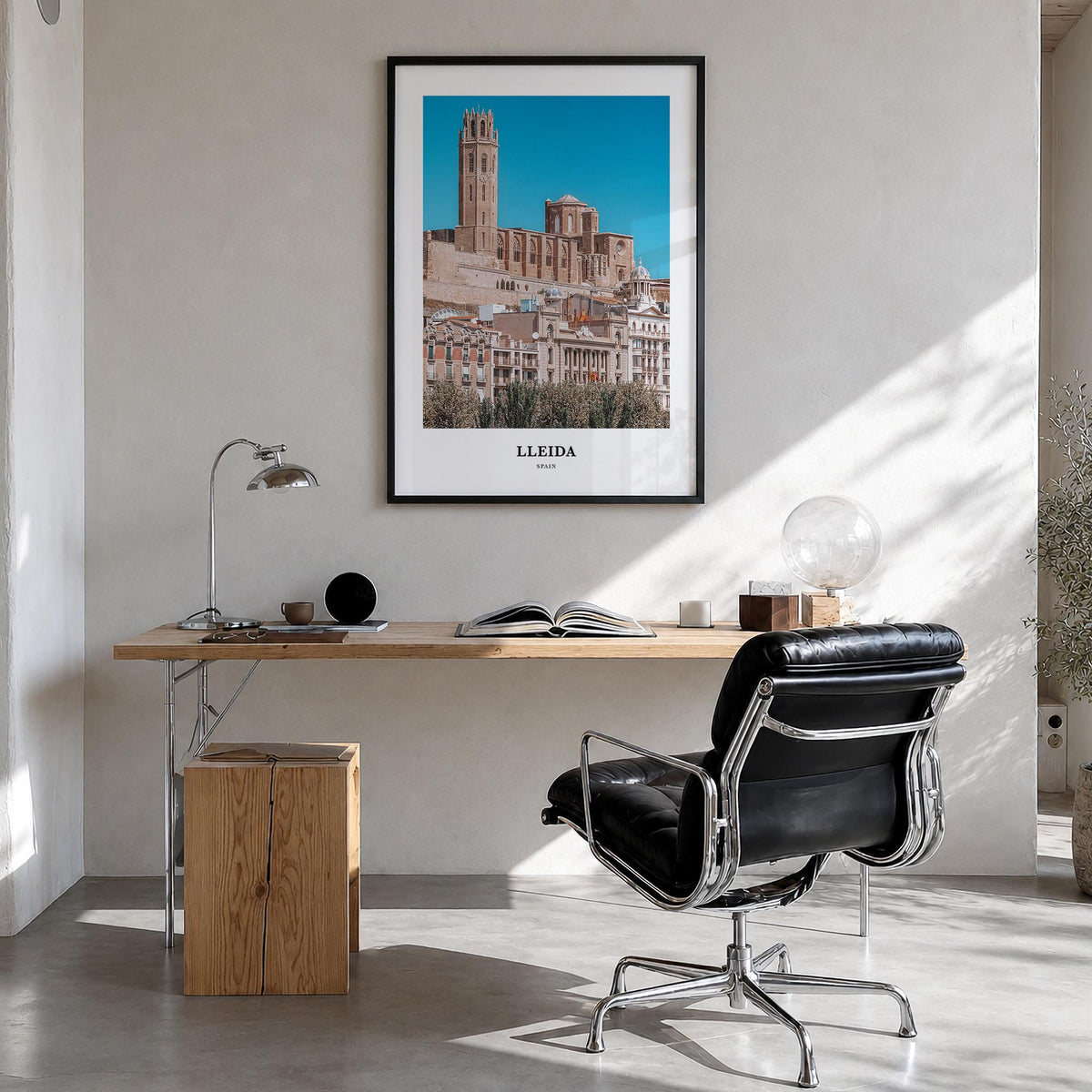 Lleida colorful classic poster of Spain – vertical wall art in black wood frame, hanging on wall