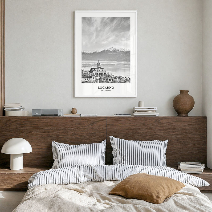 Locarno Classic Poster in a white wood frame, hanging in a bedroom